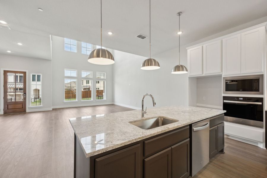 Furnished interior view inside a new home in Newman Village Townhomes, Frisco (Image 5).