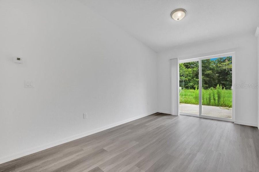 Dining Room with Sliding Glass Door to Backyard