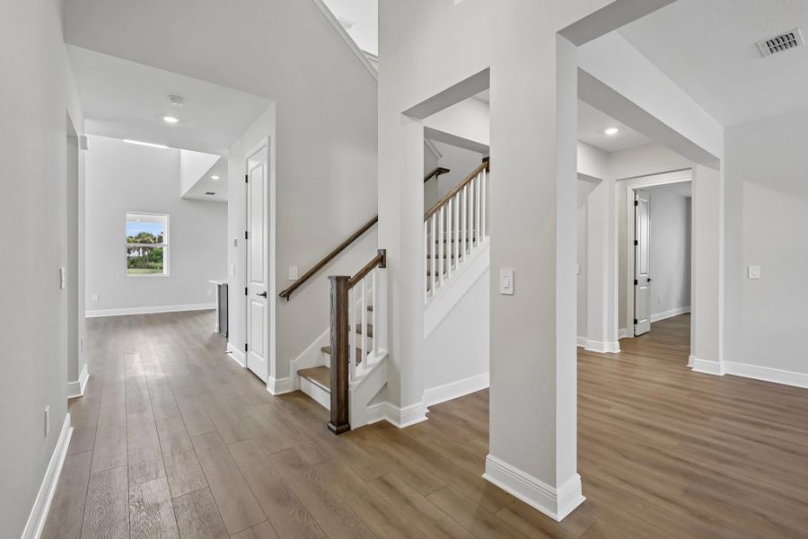Foyer into the home welcomes you into the dining space to the right