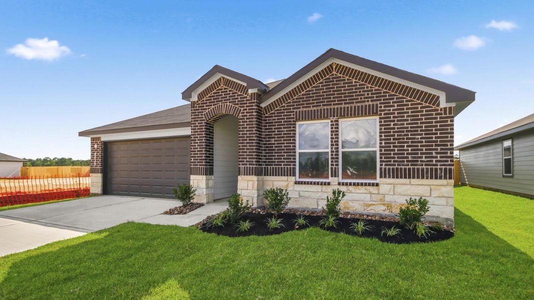 Front exterior of a new home in Chapel Lakes, Montgomery, TX, highlighting curb appeal (Image 18).
