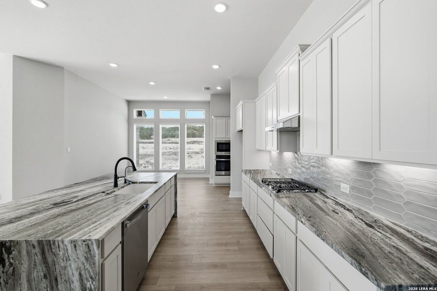 Furnished interior view inside a new home in Potranco Oaks, Castroville (Image 17).