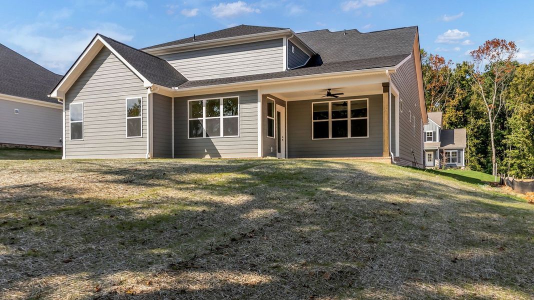 Exterior details and patio area of a home in Brush Creek, Fairview (Image 25).