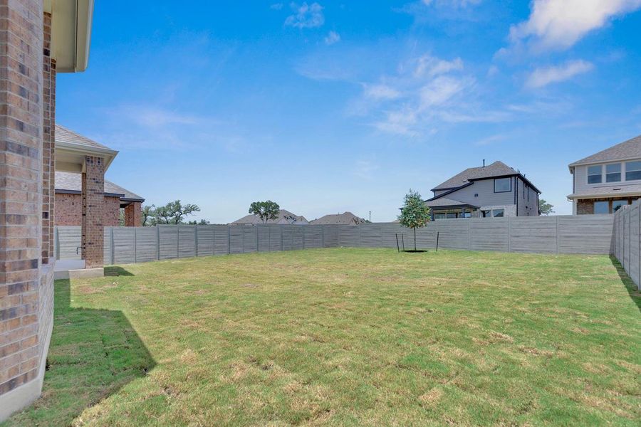 Front exterior of a new home in Wolf Ranch: 51ft. lots, Georgetown, TX, highlighting curb appeal (Image 2). Front exterior of a new home in Wolf Ranch: 51ft. lots, Georgetown, TX, highlighting curb appeal (Image 2).