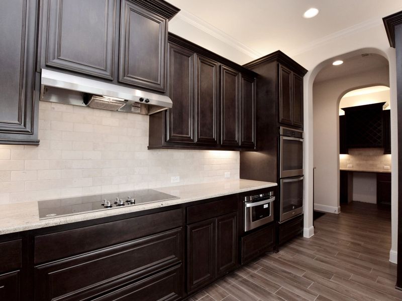 Representative furnished interior of a home built from the San Simeon I by Giddens Homes in Clearwater Ranch, Liberty Hill (Image 332).
