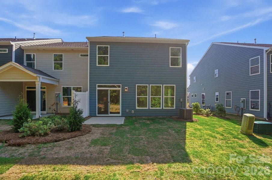 Exterior details and patio area of a home in Blythe Mill Townhomes, Waxhaw (Image 26). Exterior details and patio area of a home in Blythe Mill Townhomes, Waxhaw (Image 26).
