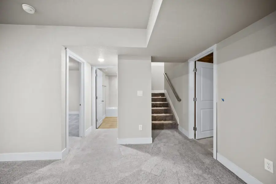 Spacious, unfurnished interior of a new home in The Glen, Colorado Springs (Image 29).