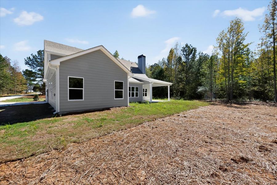 Exterior details and patio area of a home in Collier Grove, Thomaston (Image 24).
