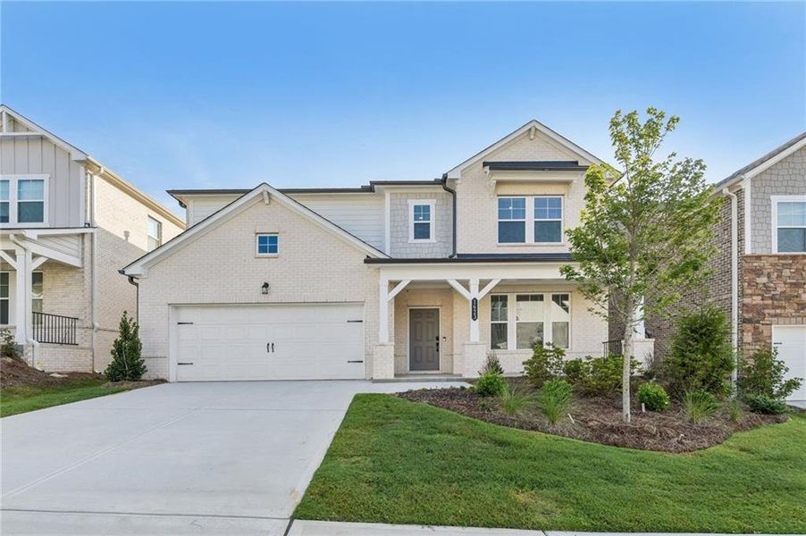 Front exterior of a new home in Auburn Glen, Dacula, GA, highlighting curb appeal (Image 23).