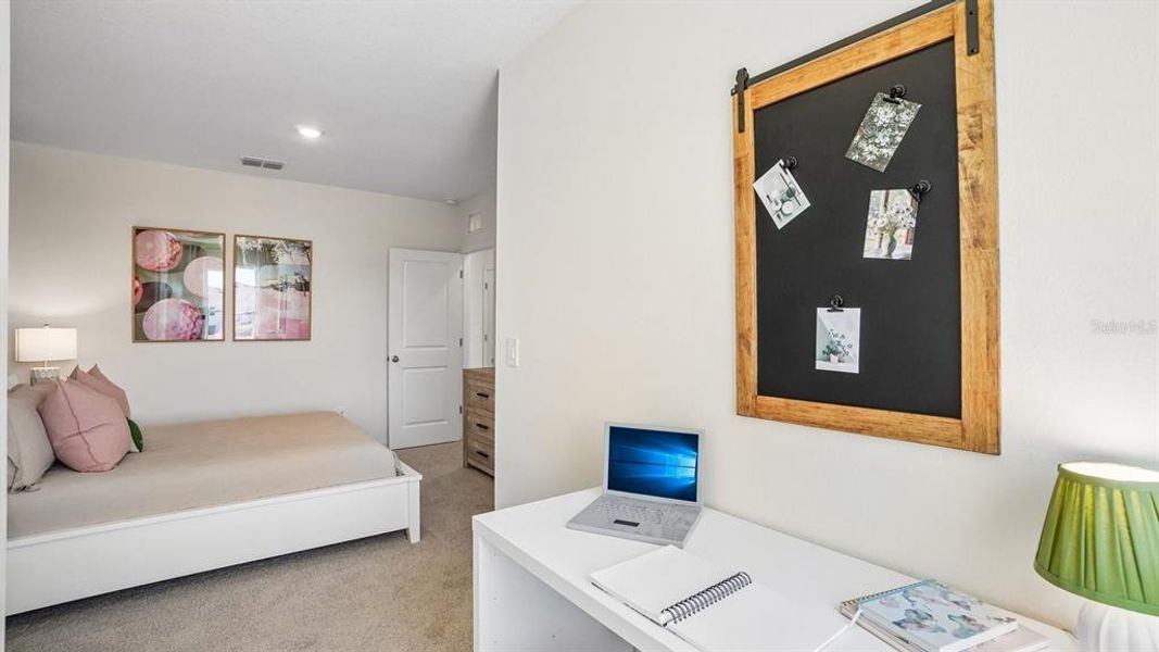 Furnished interior view inside a new home in Sanctuary at Citrus Park Townhomes, Tampa (Image 26).