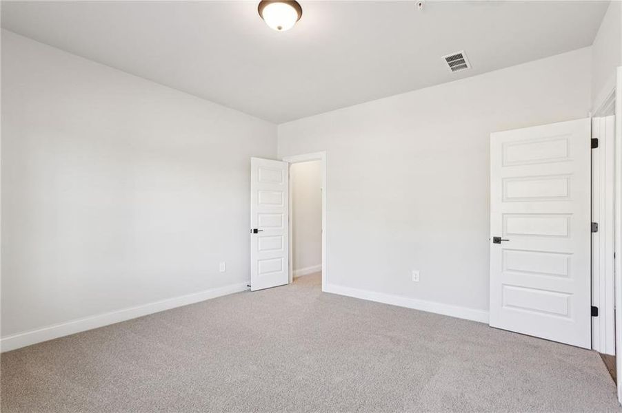 Spacious, unfurnished interior of a new home in Hemingway - Highland Series, Cumming (Image 35). Spacious, unfurnished interior of a new home in Hemingway - Highland Series, Cumming (Image 35).