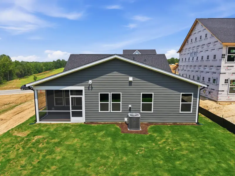 Exterior details and patio area of a home in McConnell Ridge, McLeansville (Image 3).
