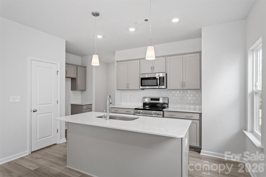 Furnished interior view inside a new home in Sloan Station, Charlotte (Image 5).