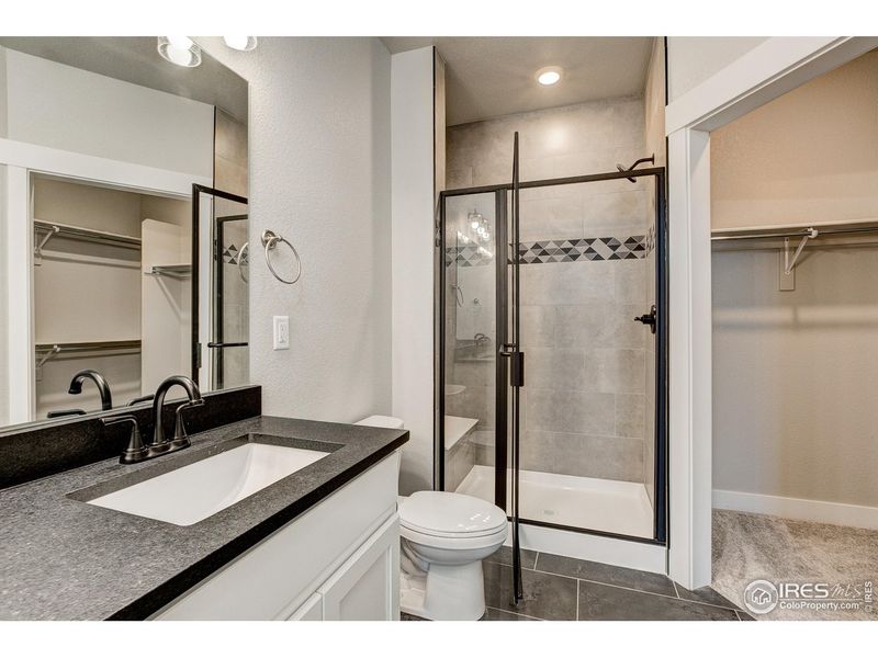 Furnished interior view inside a new home in Highlands at Fox Hill - The Flats, Longmont (Image 10).