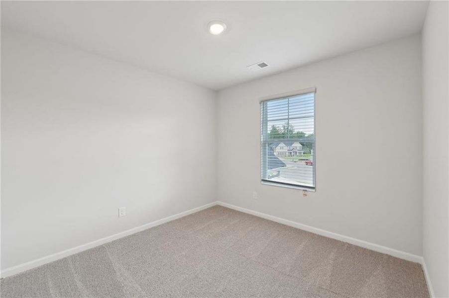 Spacious, unfurnished interior of a new home in Stephen's Landing, Loganville (Image 25).