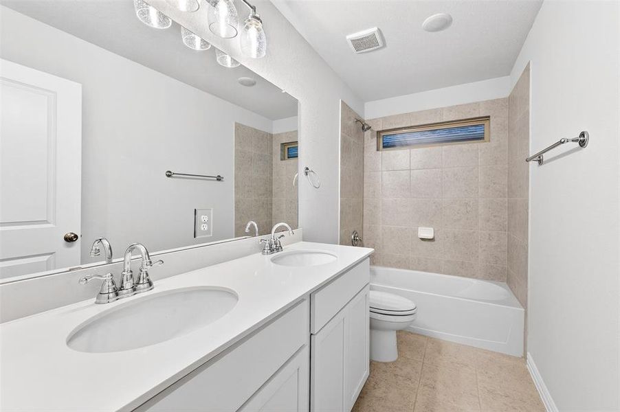 Furnished interior view inside a new home in Lily Creek at Sutton Fields, Aubrey (Image 14).