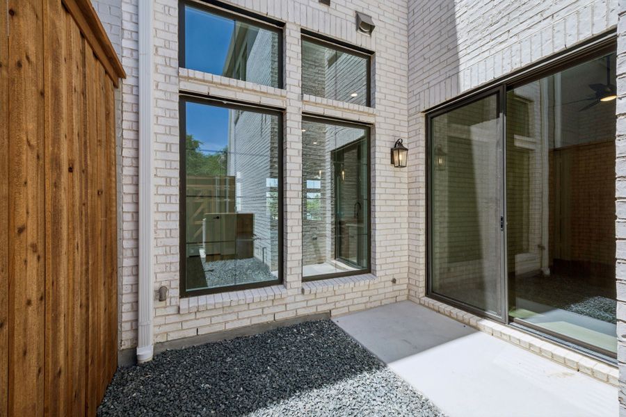 Representative exterior details of a home built from the Washington by Centre Living Homes in Newman Village Townhomes, Frisco (Image 18).