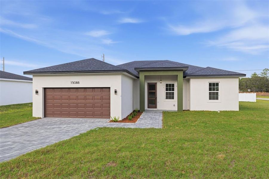 Front exterior of a new home in , Ocala, FL, highlighting curb appeal (Image 18).