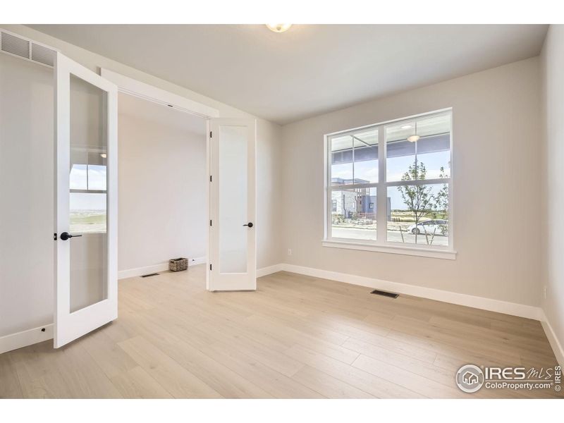 Spacious, unfurnished interior of a new home in RainDance National 60/70, Windsor (Image 24).