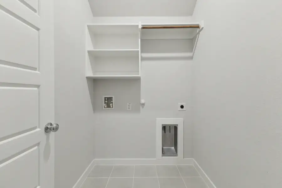 Utility room in the Quartz home plan by Trophy Signature Homes – REPRESENTATIVE PHOTO