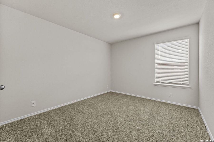Spacious, unfurnished interior of a new home in Hunters Ranch, San Antonio (Image 14).