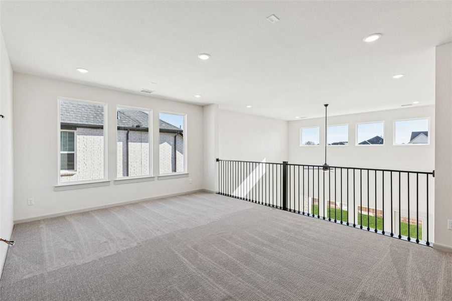 The light filled game room is the perfect place to enjoy some family fun time!