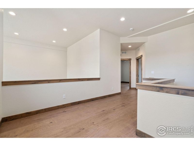 Two bedrooms upstairs, view from loft