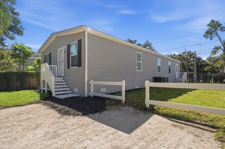 Exterior details and patio area of a home in , Zephyrhills (Image 21).