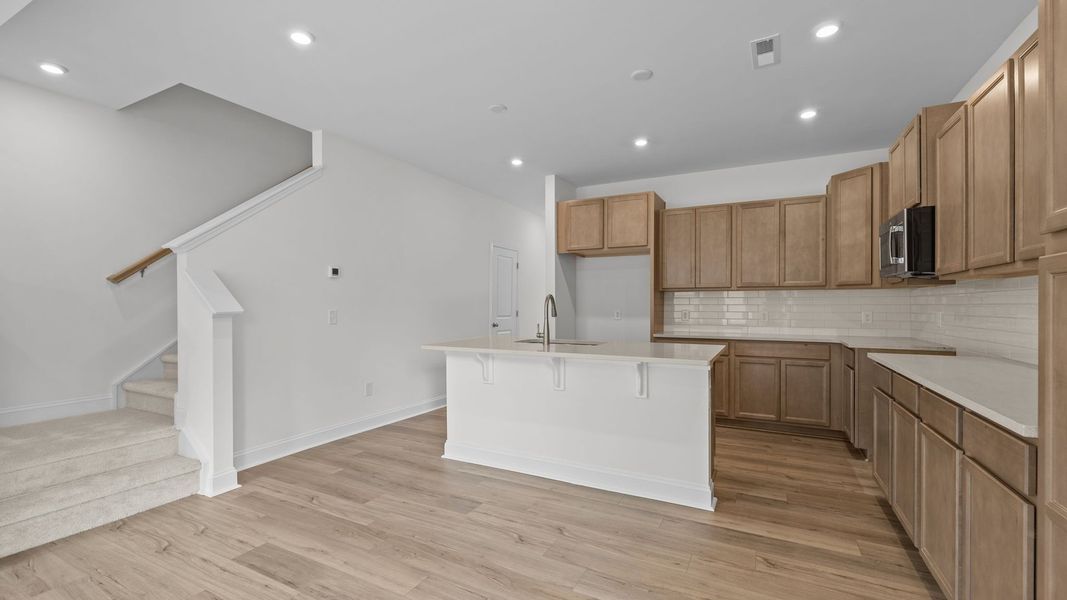 Furnished interior view inside a new home in Leigh Park, Charlotte (Image 6).