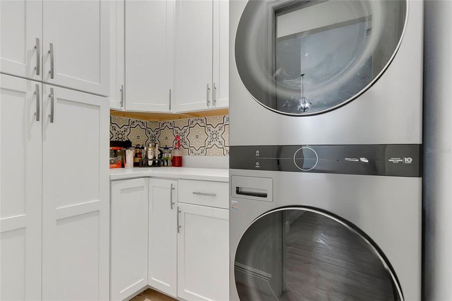 Interior Utility Room with ample storage and FULL SIZED stackable washer/dryer Interior Utility Room with ample storage and FULL SIZED stackable washer/dryer