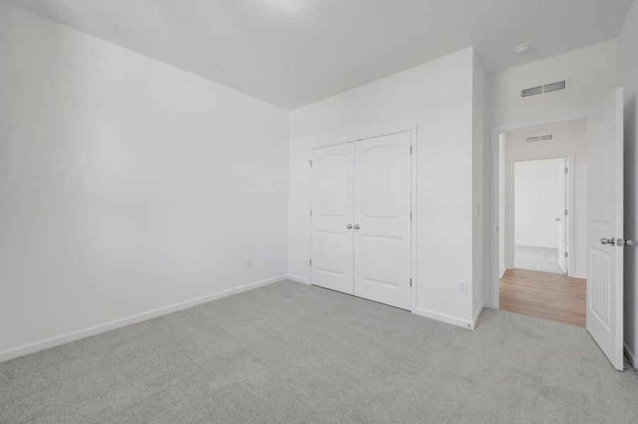 Spacious, unfurnished interior of a new home in Providence Creek, Fuquay Varina (Image 26).