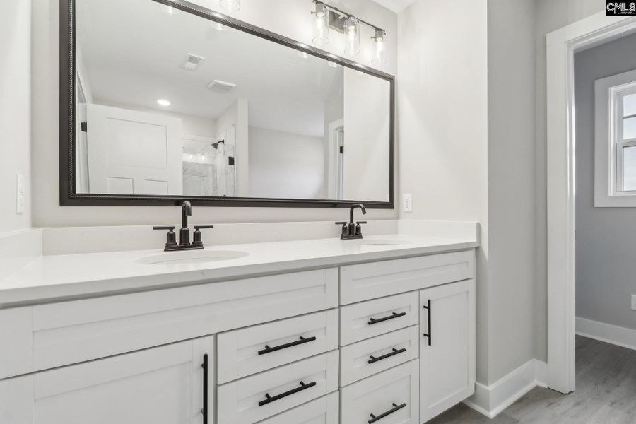 Furnished interior view inside a new home in Collins Cove, Chapin (Image 8). Furnished interior view inside a new home in Collins Cove, Chapin (Image 8).