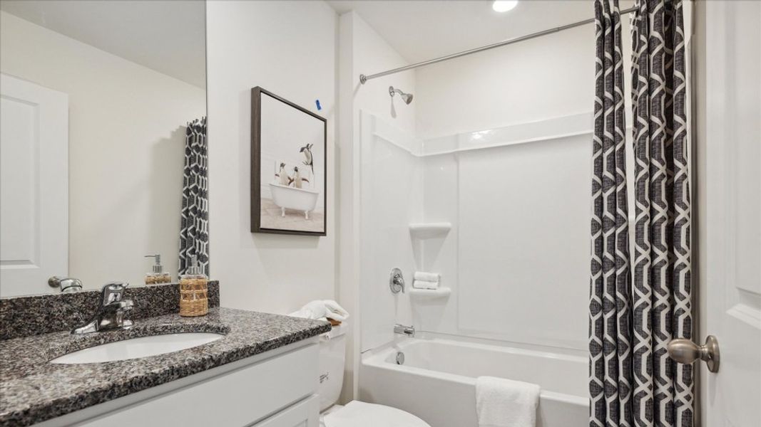 Representative furnished interior of a home built from the Altamont Townhome by D.R. Horton in Saint Marc's, Powell (Image 20).