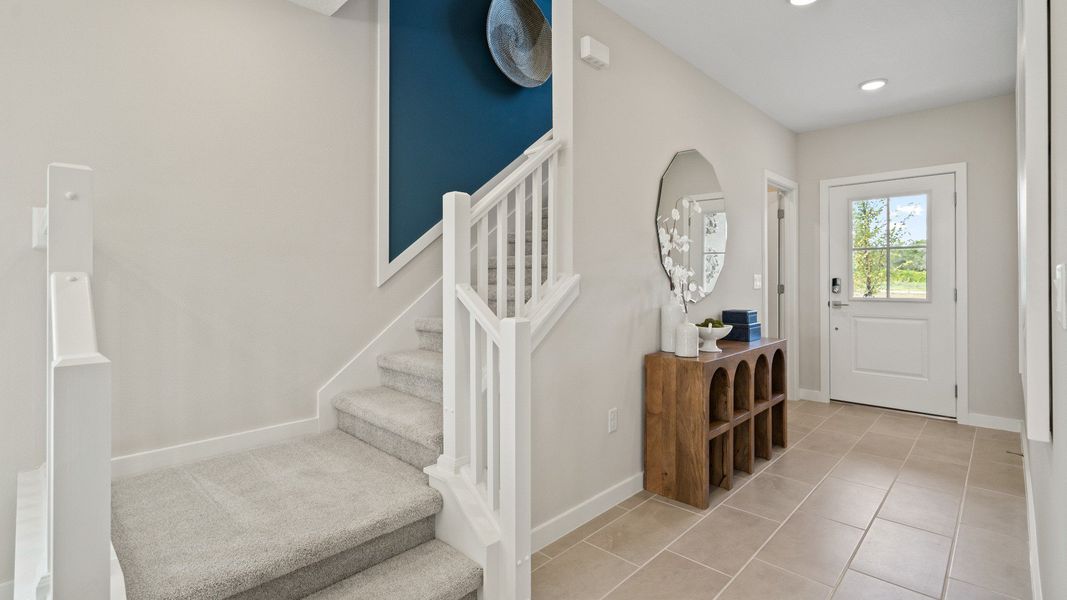 View of Stairs near entry in Ponte Vedra New Home Plan in Hamilton Bluff in Haines City, FL by DRB Homes