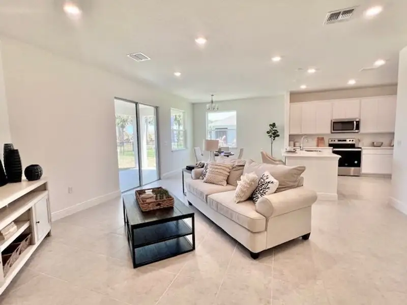 Furnished interior view inside a new home in Lakes At St Sebastian, Micco (Image 10).
