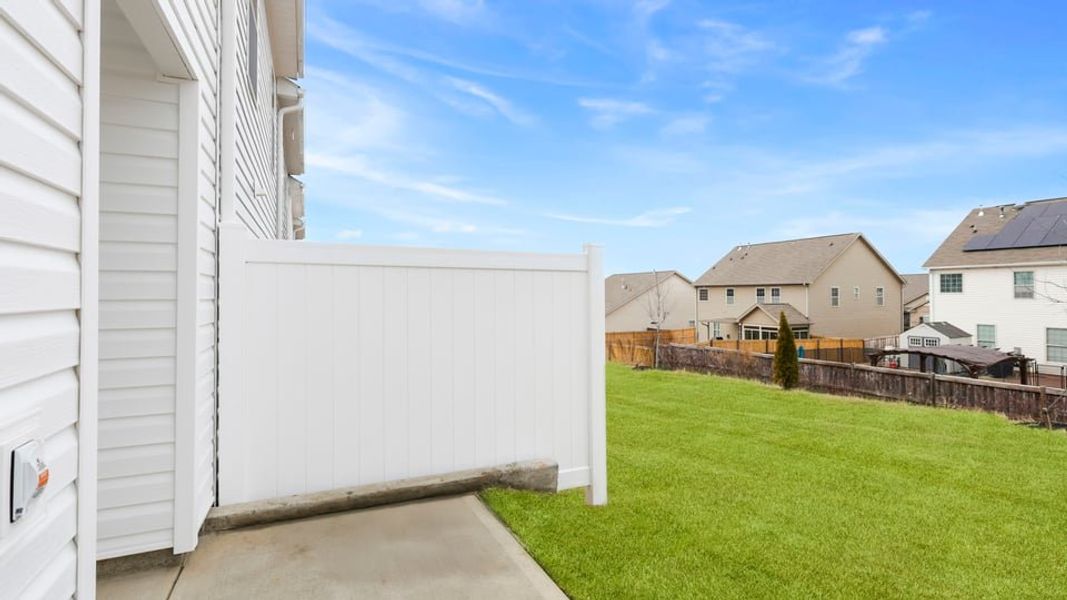 Exterior details and patio area of a home in Covington Village, Greer (Image 23).