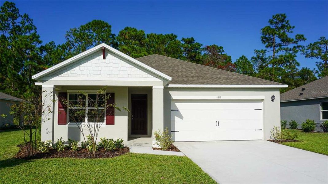 Front exterior of a new home in , Daytona Beach, FL, highlighting curb appeal (Image 1). Front exterior of a new home in , Daytona Beach, FL, highlighting curb appeal (Image 1).