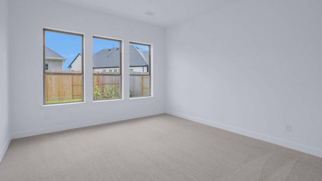 Spacious, unfurnished interior of a new home in The Grand Prairie 40', Hockley (Image 12).
