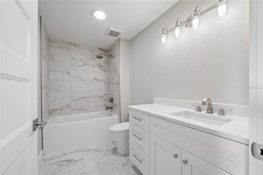 Furnished interior view inside a new home in , Madeira Beach (Image 11).