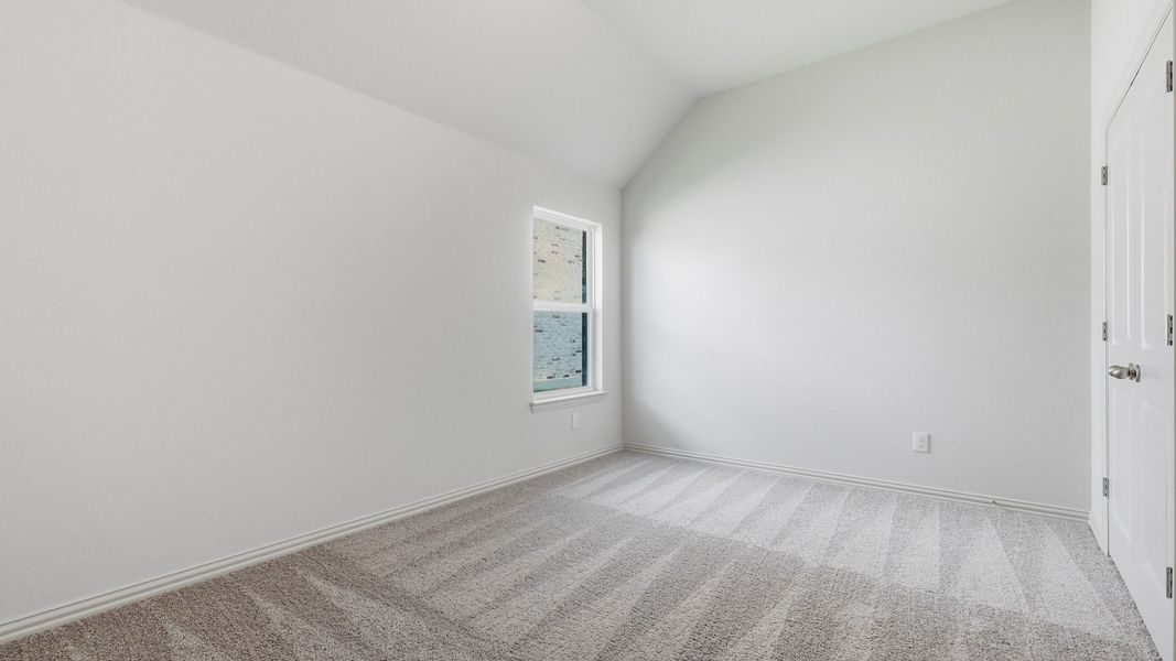 Furnished interior view inside a new home in Green Meadows Premier, Celina (Image 10).