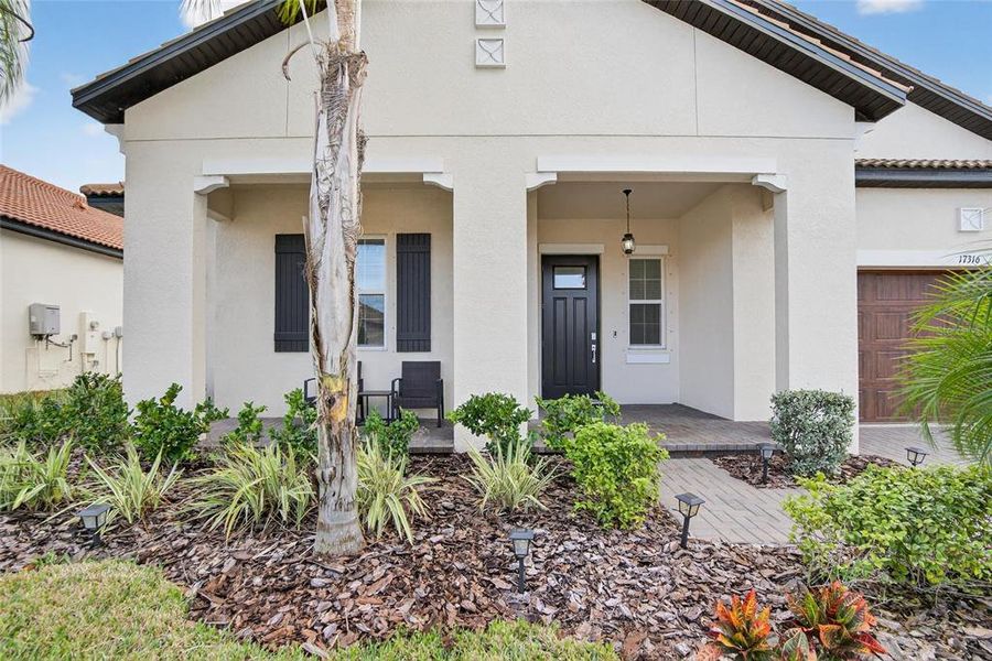 Exterior details and patio area of a home in Southshore Bay: The Estates, Wimauma (Image 45).