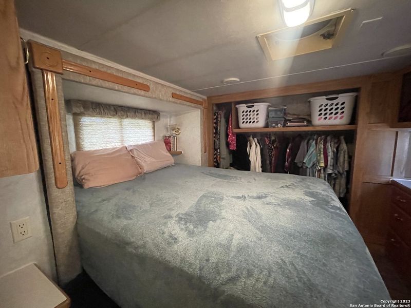 Furnished interior view inside a new home in , Bandera (Image 57).