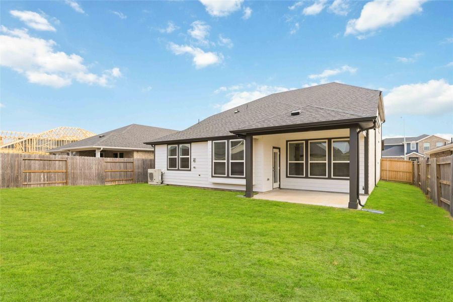Exterior details and patio area of a home in Sunterra, Katy (Image 3). Exterior details and patio area of a home in Sunterra, Katy (Image 3).
