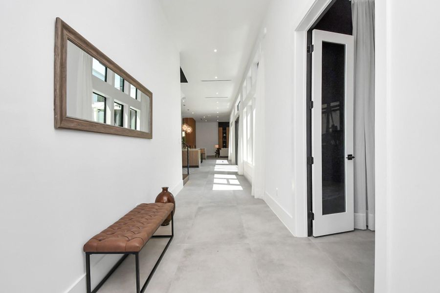 Large format tile throughout the home.