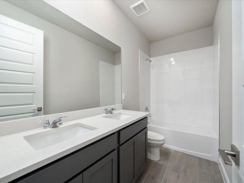 Bathroom in the Onyx floorplan at 6383 NW Sweetwood Drive in Brystol at Wylder