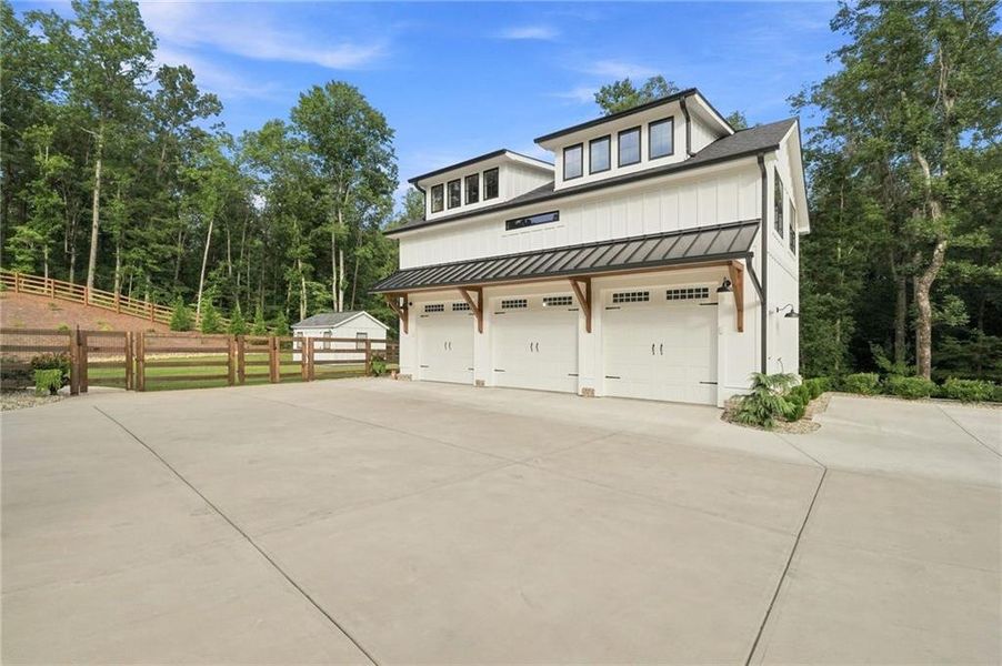Front exterior of a new home in , Ball Ground, GA, highlighting curb appeal (Image 28). Front exterior of a new home in , Ball Ground, GA, highlighting curb appeal (Image 28).
