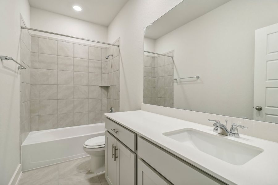 Guest bathroom in the Hughes floorplan at a Meritage Homes community.