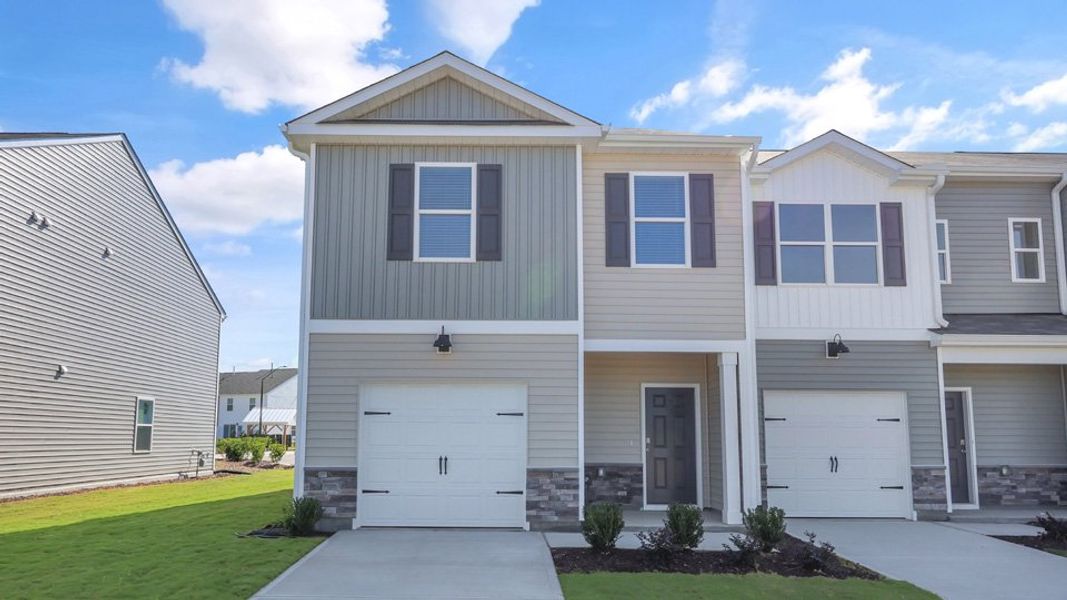 Representative exterior photo of a completed home built from the Mitchell by D.R. Horton in The Townes at Honeycutt Oaks, Angier, NC (Image 20).