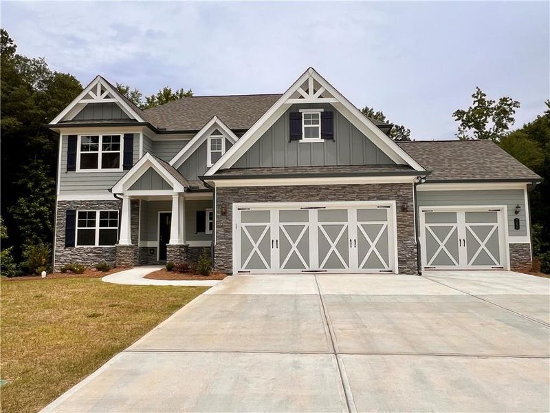 Front exterior of a new home in , Jefferson, GA, highlighting curb appeal (Image 21).