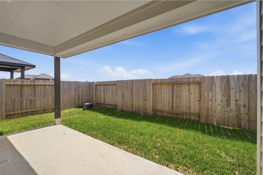 Exterior details and patio area of a home in Trails at Woodhaven Lakes, La Marque (Image 2). Exterior details and patio area of a home in Trails at Woodhaven Lakes, La Marque (Image 2).