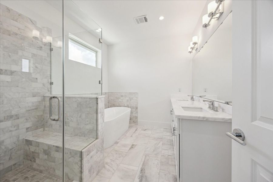 Primary Bathroom * Double Sinks * Modern Fixtures and Lighting. Primary Bathroom * Double Sinks * Modern Fixtures and Lighting.